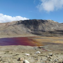 Red lake close to the Zongo Pass